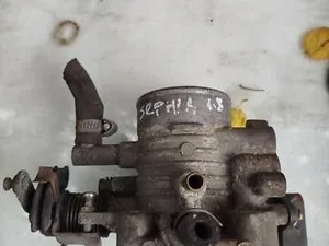 Дросельна заслінка 0K24718911 Kia Sephia II 1.8
