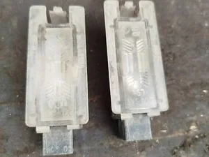 Ліхтар підсвітки номера 7700842700 Renault Megane