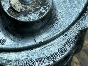 Натягувач ременя генератора 1112000770 Mercedes W124 W202